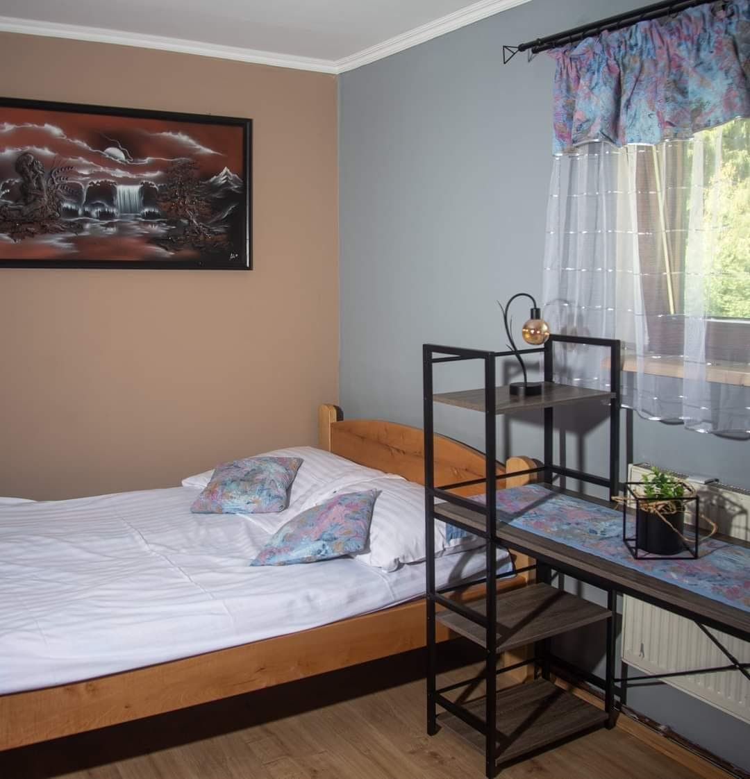 Część noclegowa z pokojem i salonem w Zajeździe Nad Olzą